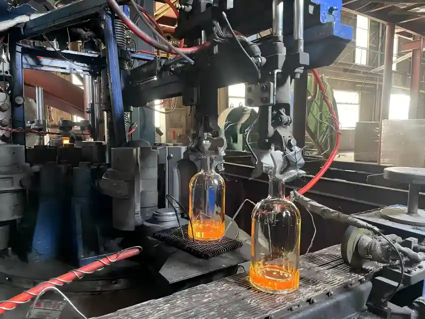 OneGlass glass bottle producer - premium spirits bottle manufacturing for UK brands